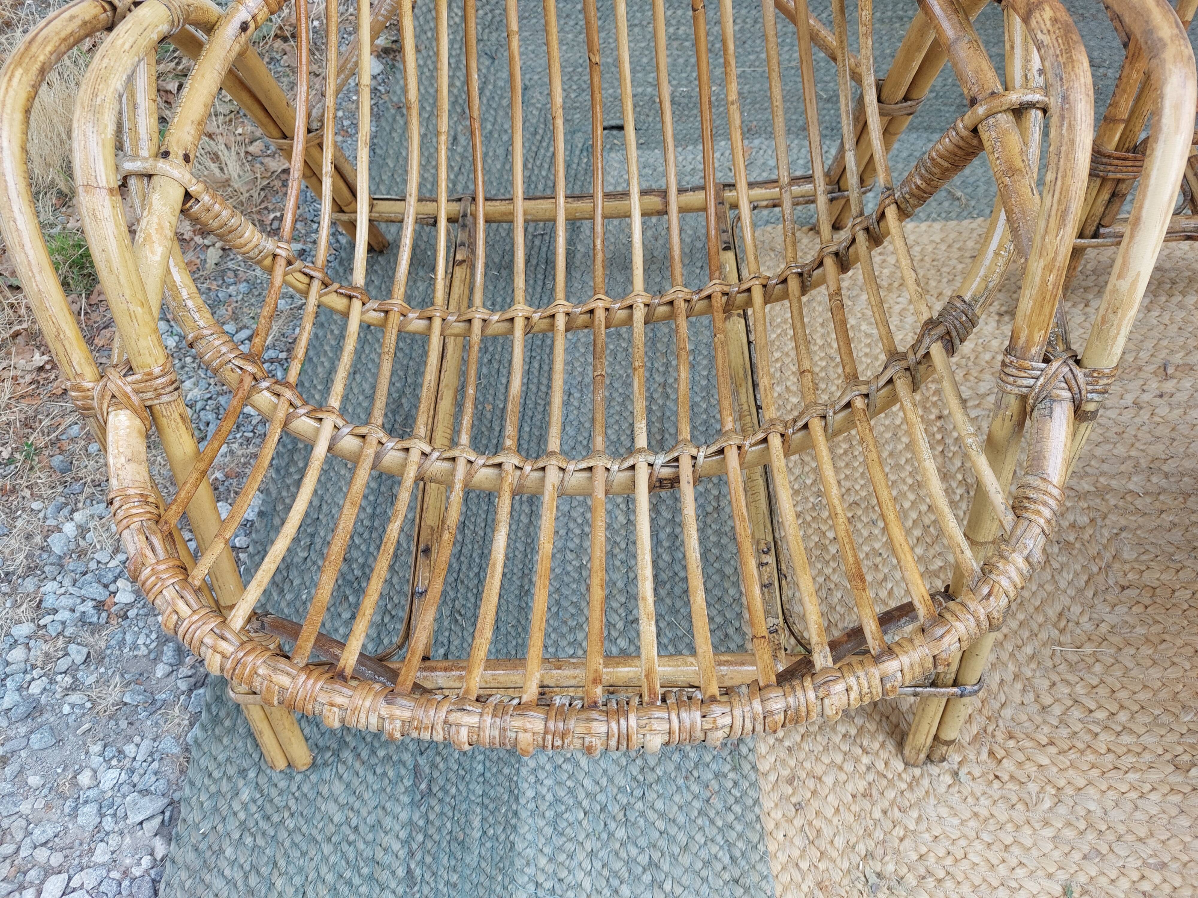 4 armchairs and a coffee table made of rattan and bamboo wood, vintage.