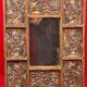 Vintage hand-painted mirror on carved wood, probably Peru, 20th century