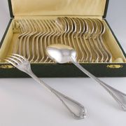 CHRISTOFLE 1907-1935 - 12 table forks and 12 Louis XVI style table spoons, Rubans model