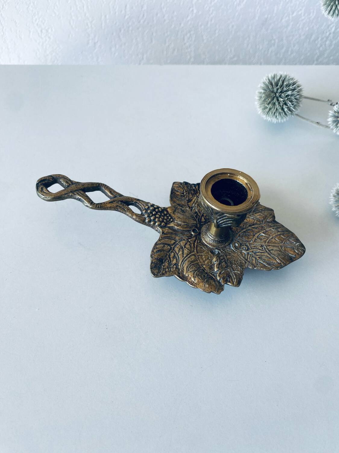 Cellar rat candle holder