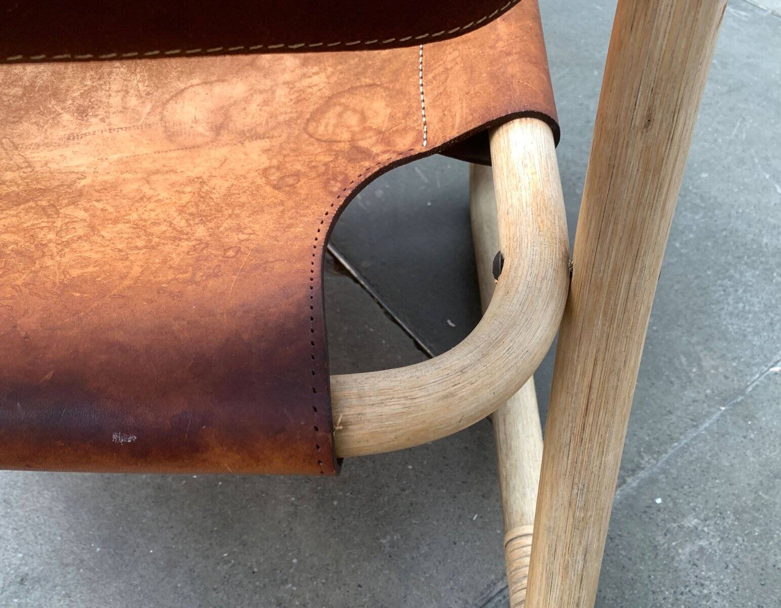 Mid-century safari lounge chair in bamboo and Danish leather, 1960s.