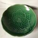 Plat vintage en faïence verte Gien