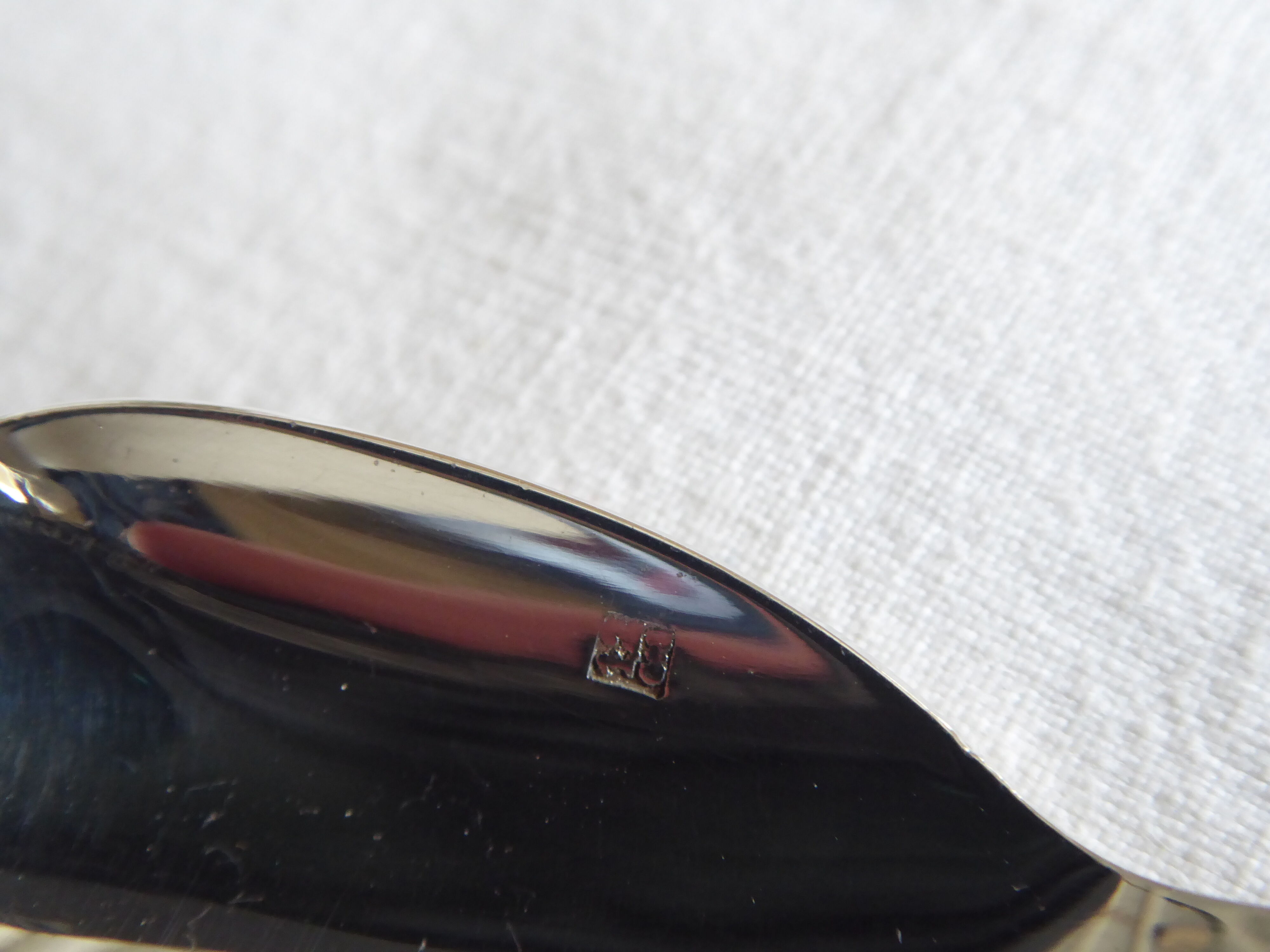 Cockerel + silver metal spoon