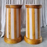 A pair of distressed bedside tables.