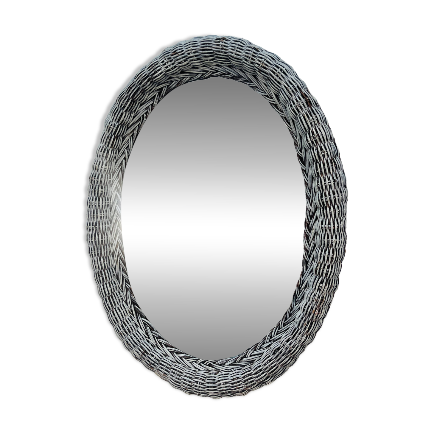 Vintage oval wicker mirror from the 1960s.