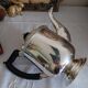 Old English coffee pot in silver-plated metal and Bakelite.