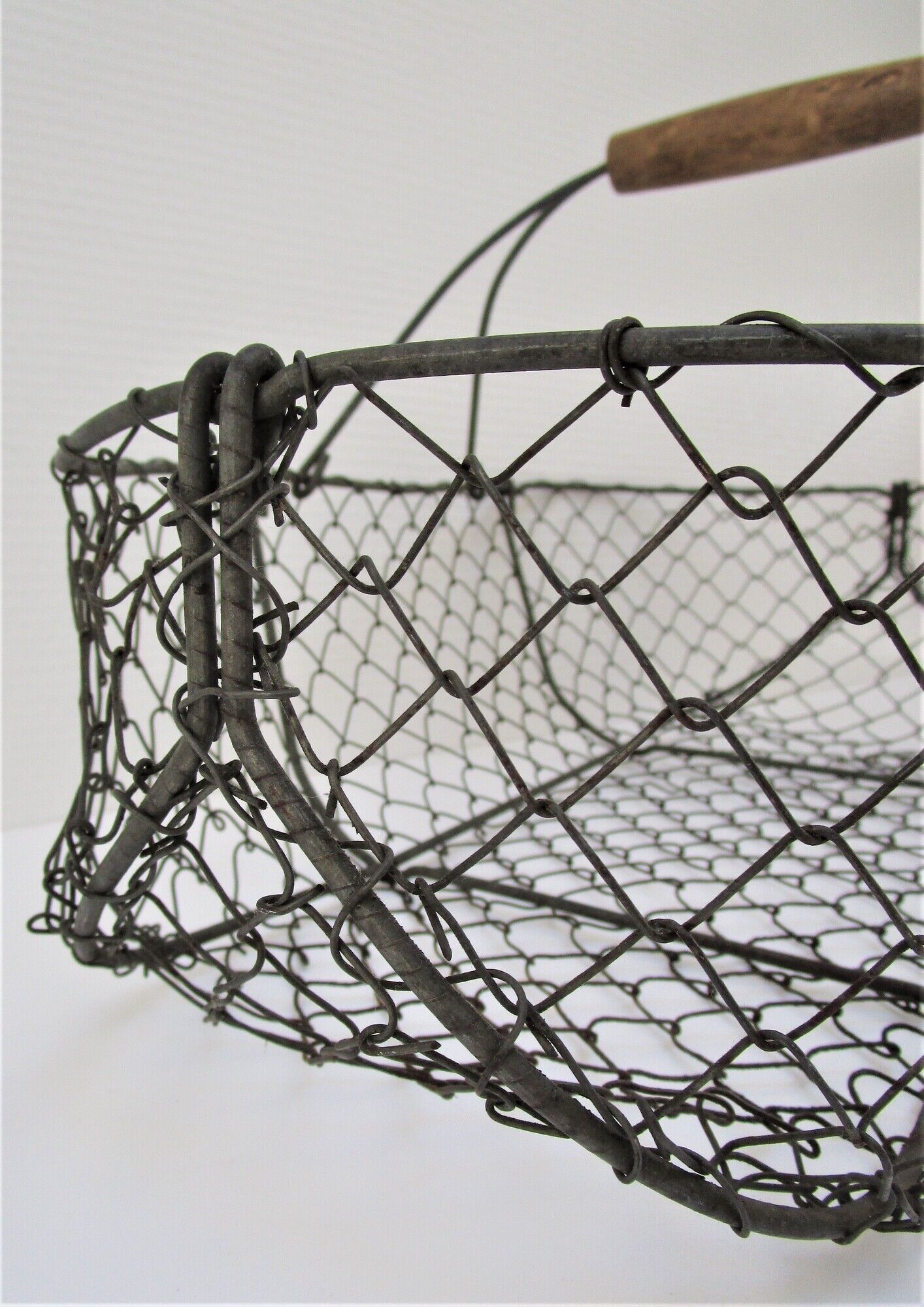 Two baskets metal and patinated wood early twentieth century