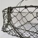 Two baskets metal and patinated wood early twentieth century