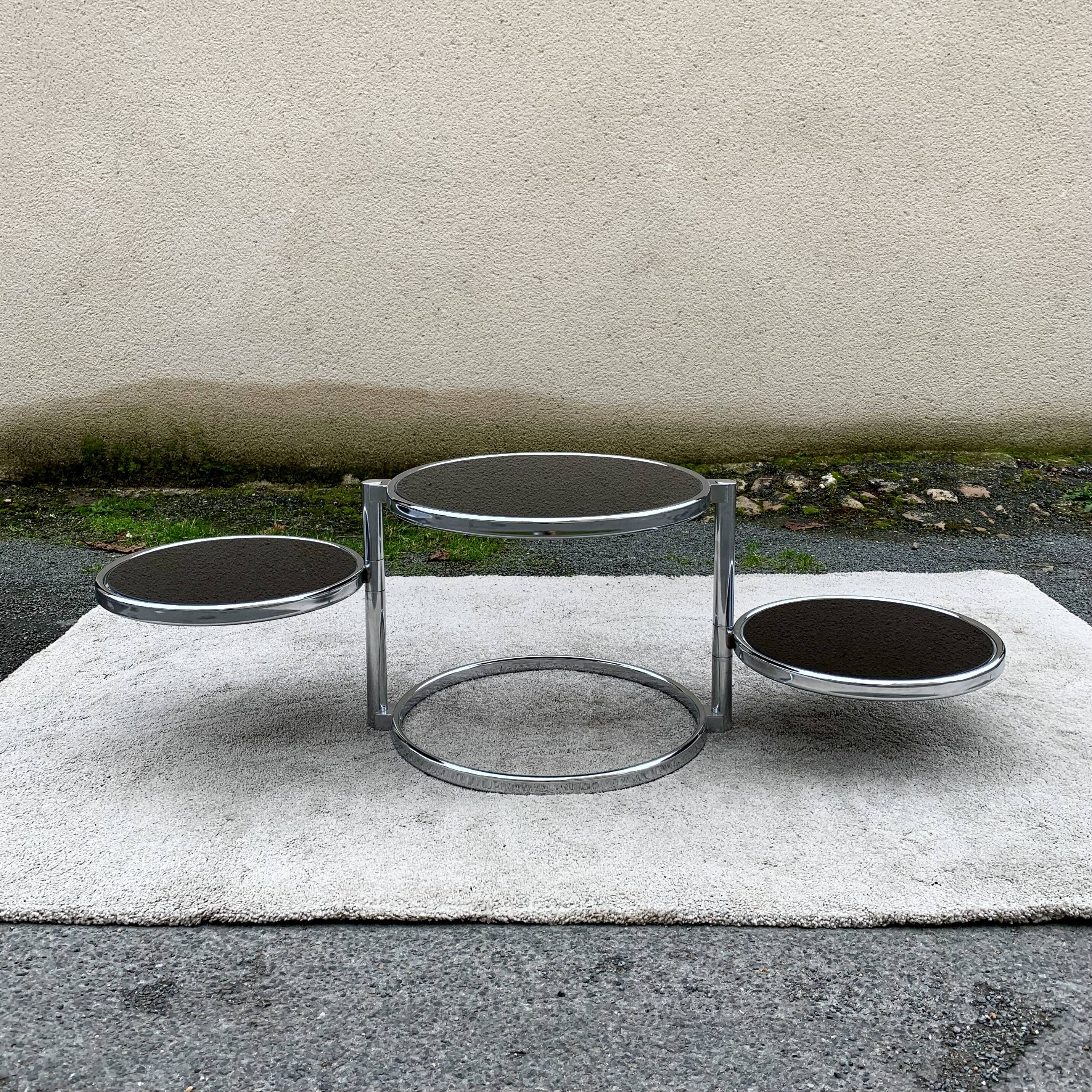 Articulated coffee table with 3 shelves, black glass and chrome, 1980