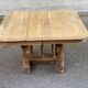 Henri II dining table stripped in solid oak from the 19th century.