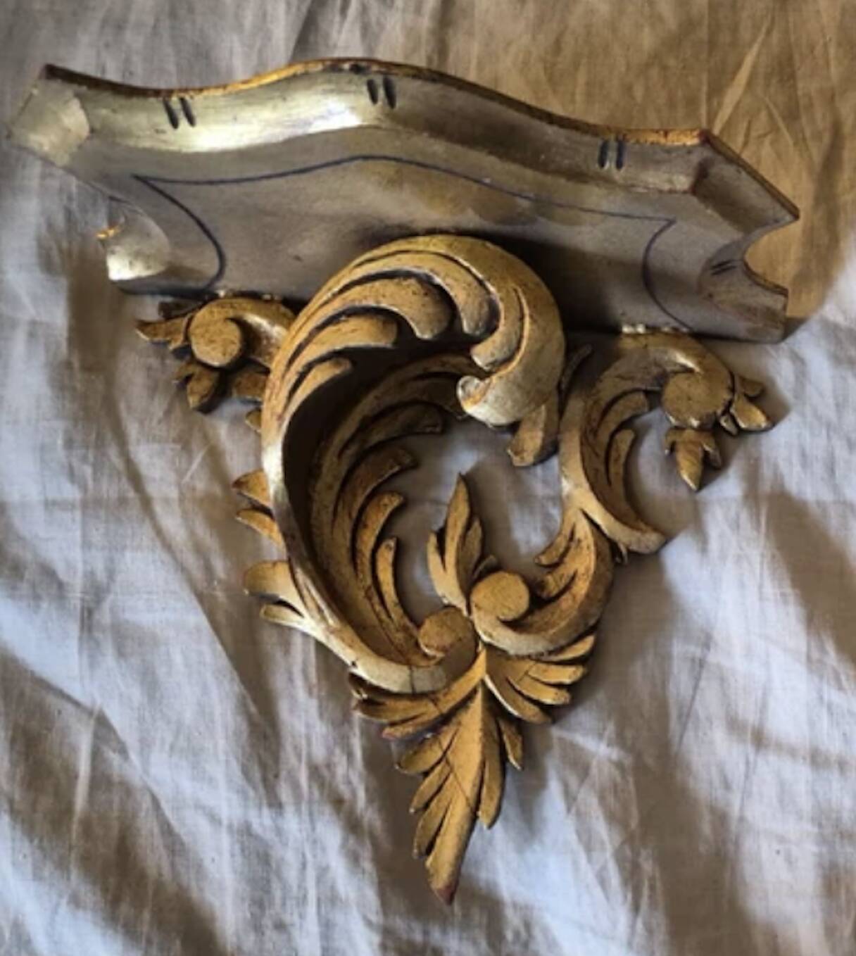 Pair of gilt wooden pedestals.