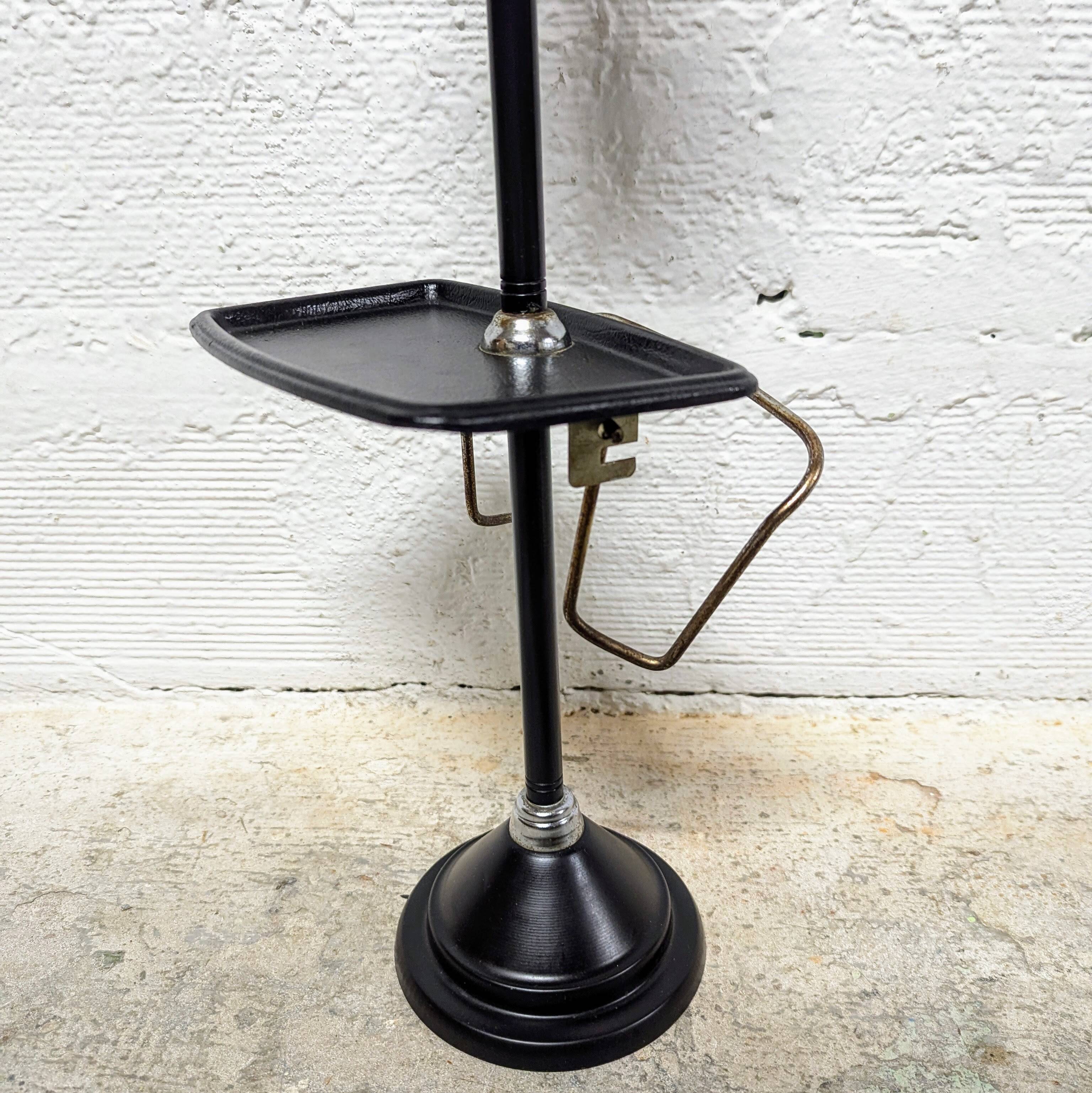 Standing ashtray with magazine rack