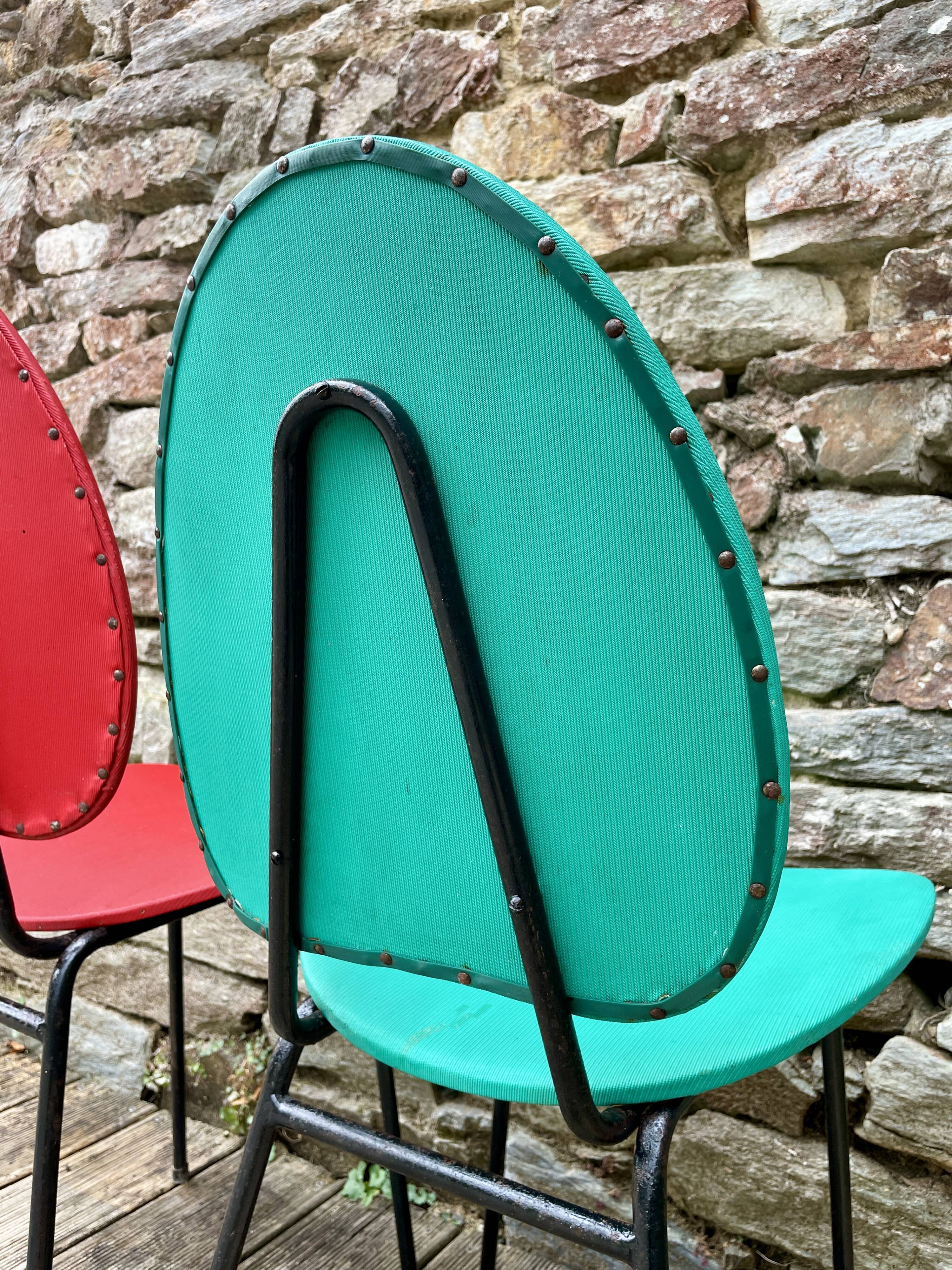 Pair of faux leather chairs from the 1950s/60s.
