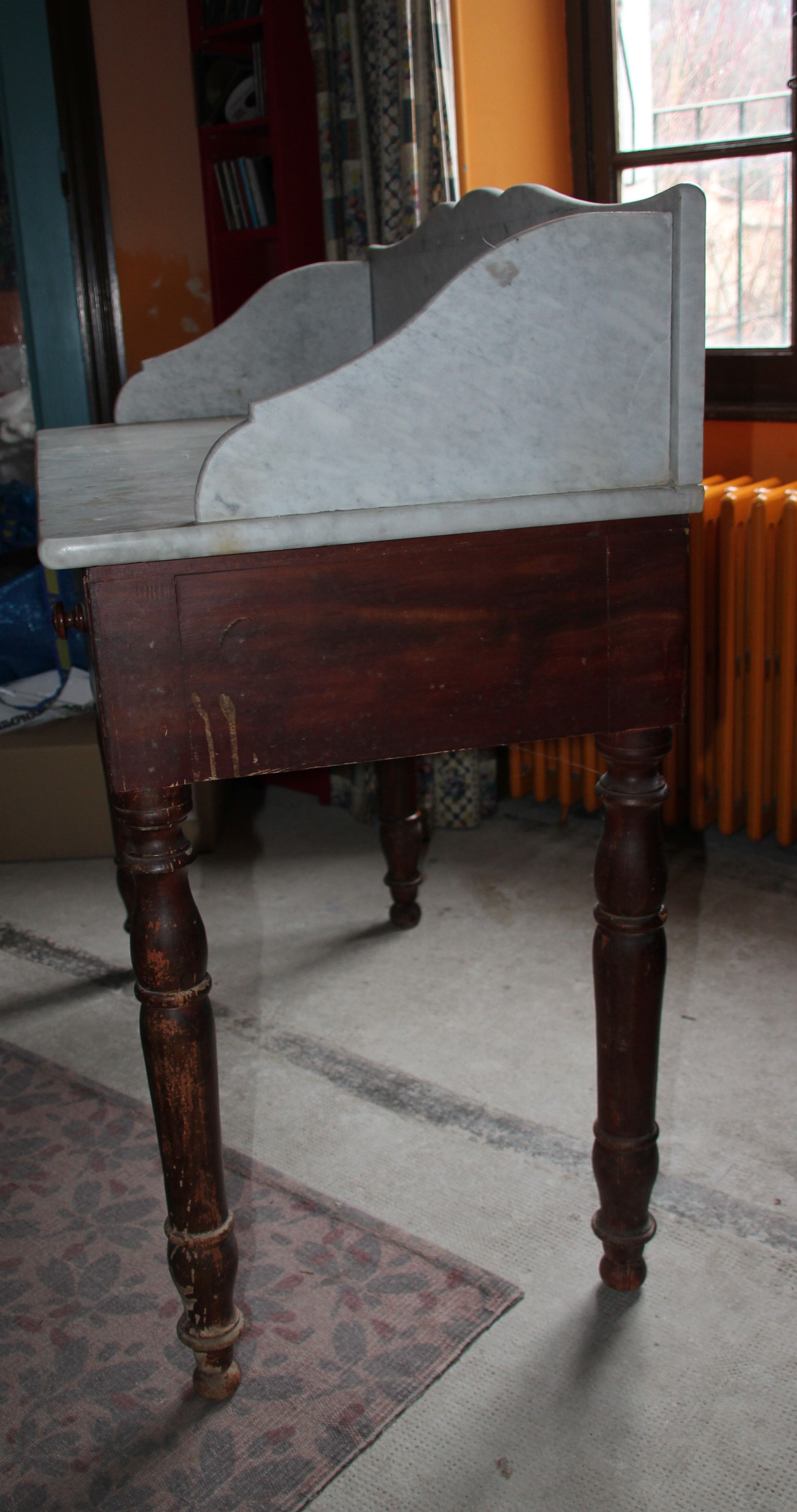 Old wooden and marble toilet table