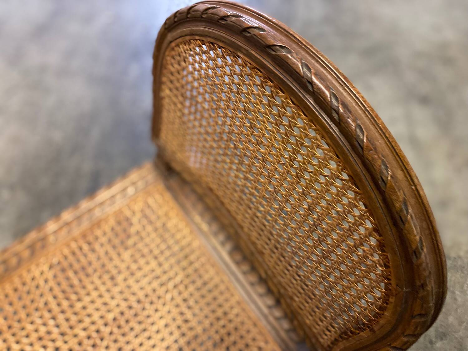 Wooden and cane bench (piano bench)