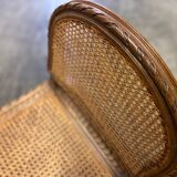 Wooden and cane bench (piano bench)