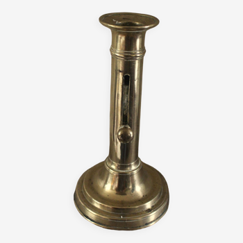 Push-button brass torch candle holder