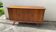 Vintage sideboard with tapered legs from the 50s and 60s.