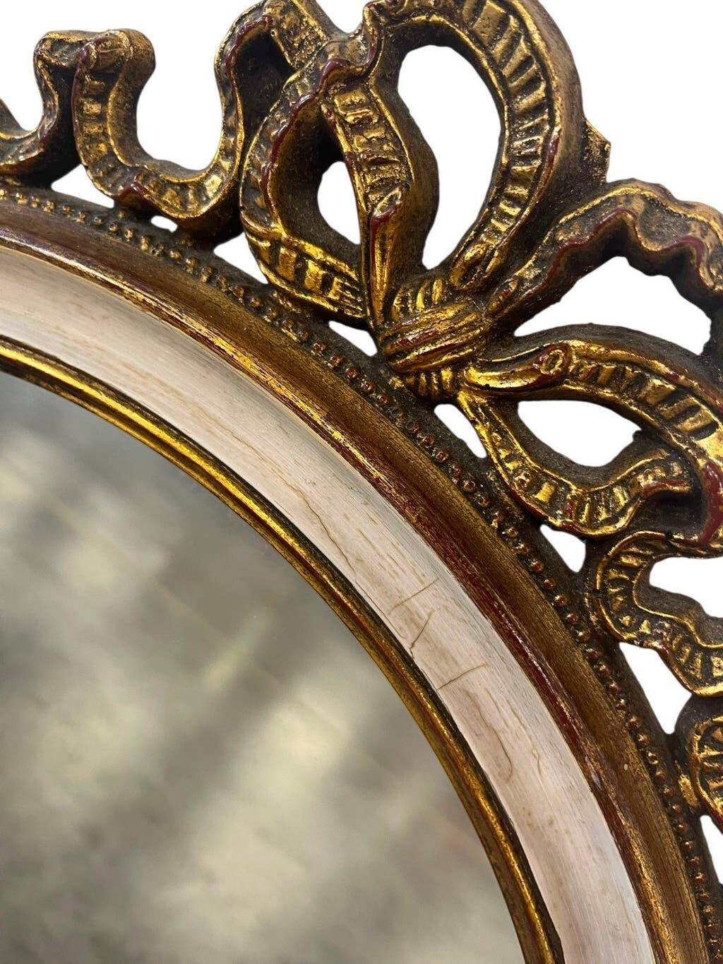 Miroir mural ovale baroque vintage à décor de noeud
