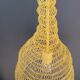 Mustard-coloured metal mesh suspension