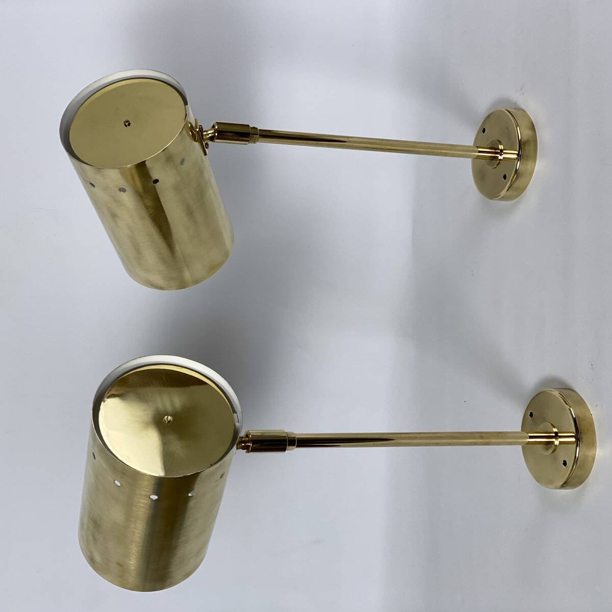 Large pair of brass wall or ceiling lights, 1960.