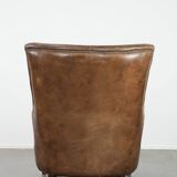 Very comfortable vintage cow leather armchair with character