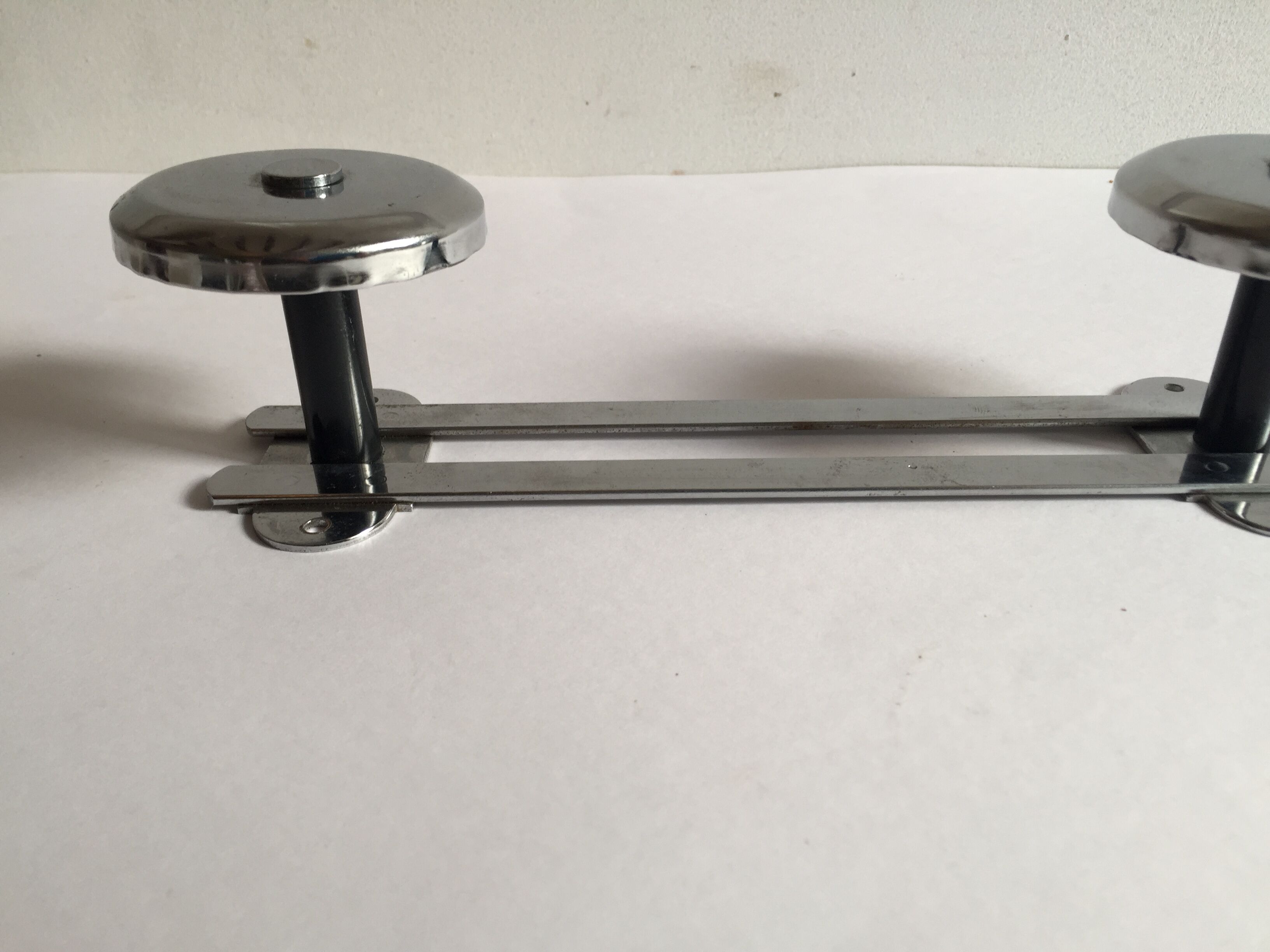 Chrome patère coat holder