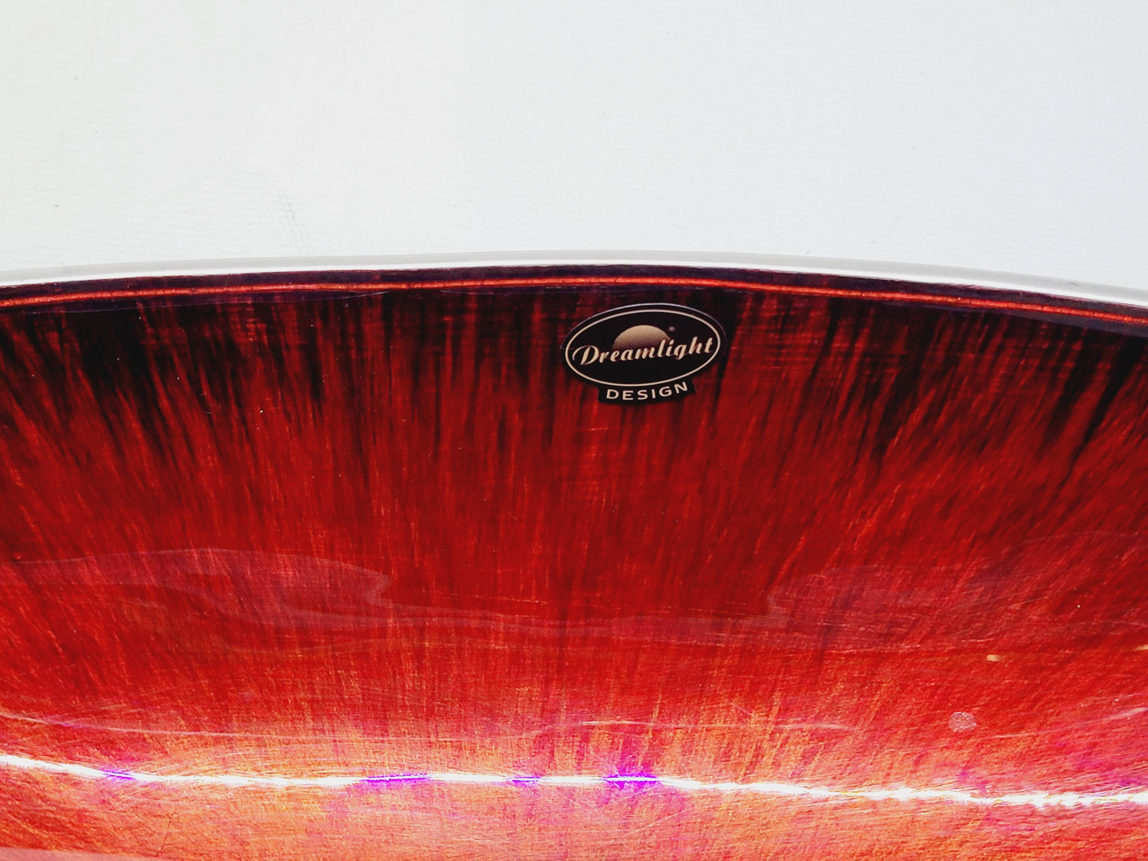 Designer bowl centerpiece in iridescent red enameled metal