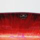 Designer bowl centerpiece in iridescent red enameled metal