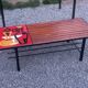 1970s design coffee table with ceramic and wood top, metal legs.