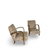 Ensemble de fauteuils Art Déco avec accoudoirs en hêtre arqués.