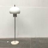 Italian space-style floor lamp from the 1960s with a stone base.