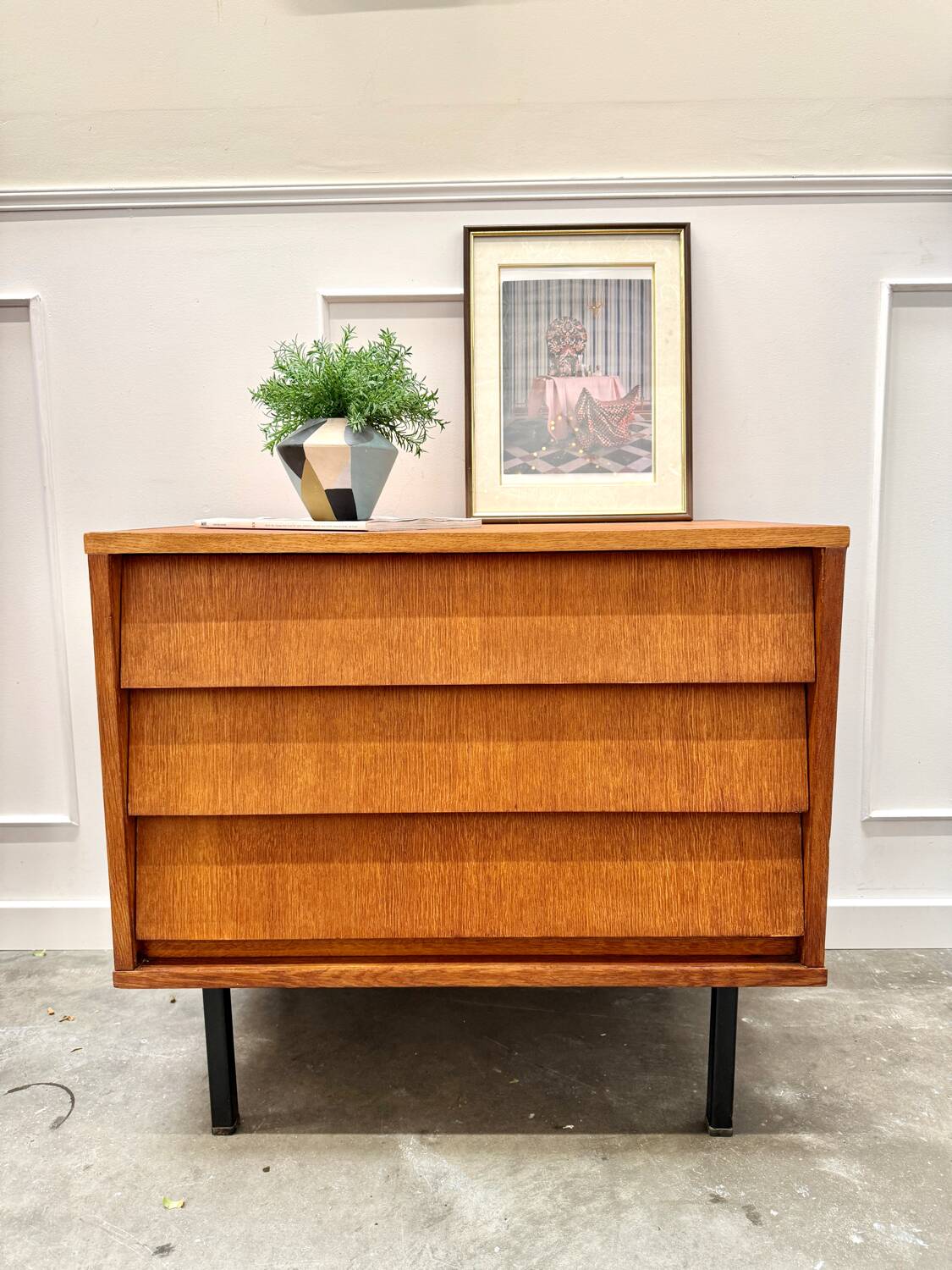 Modernist chest of drawers with slanted drawers