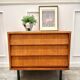 Modernist chest of drawers with slanted drawers