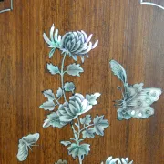 Asian screen in carved wood and mother-of-pearl marquetry.