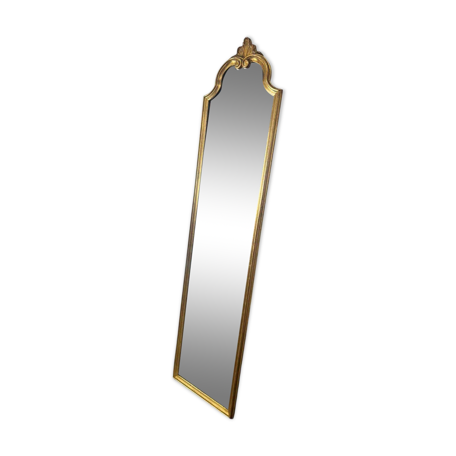 Narrow and tall antique mirror, adorned with golden patterns.