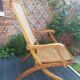 Folding beech cane armchair