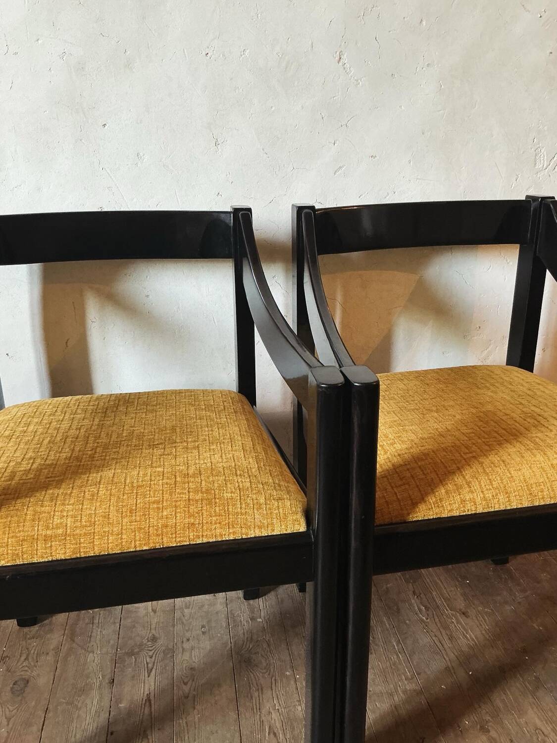 Four designer armchairs