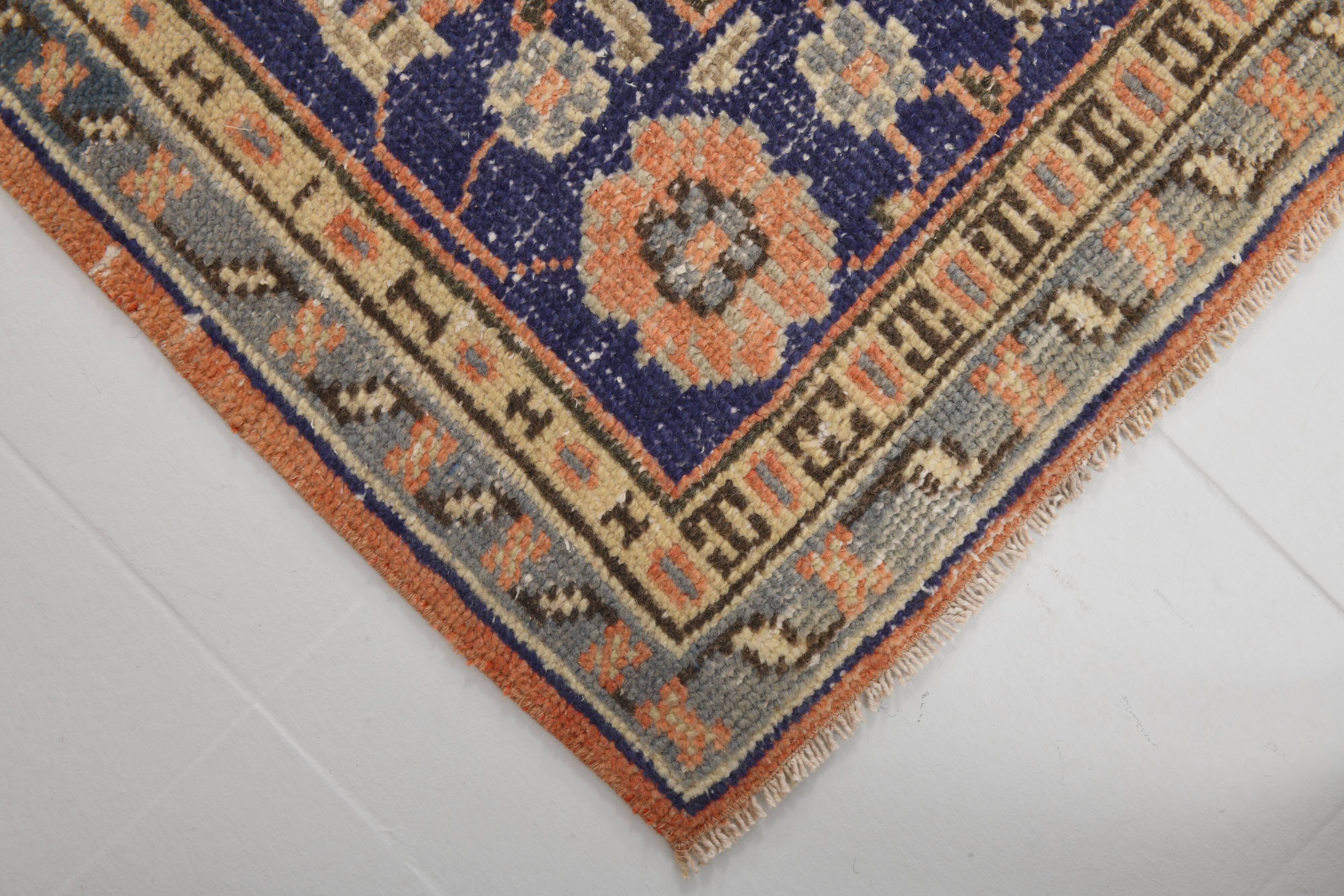 Orange & navy blue turkish vintage rug