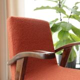 Vintage orange curly papaya armchair 1970