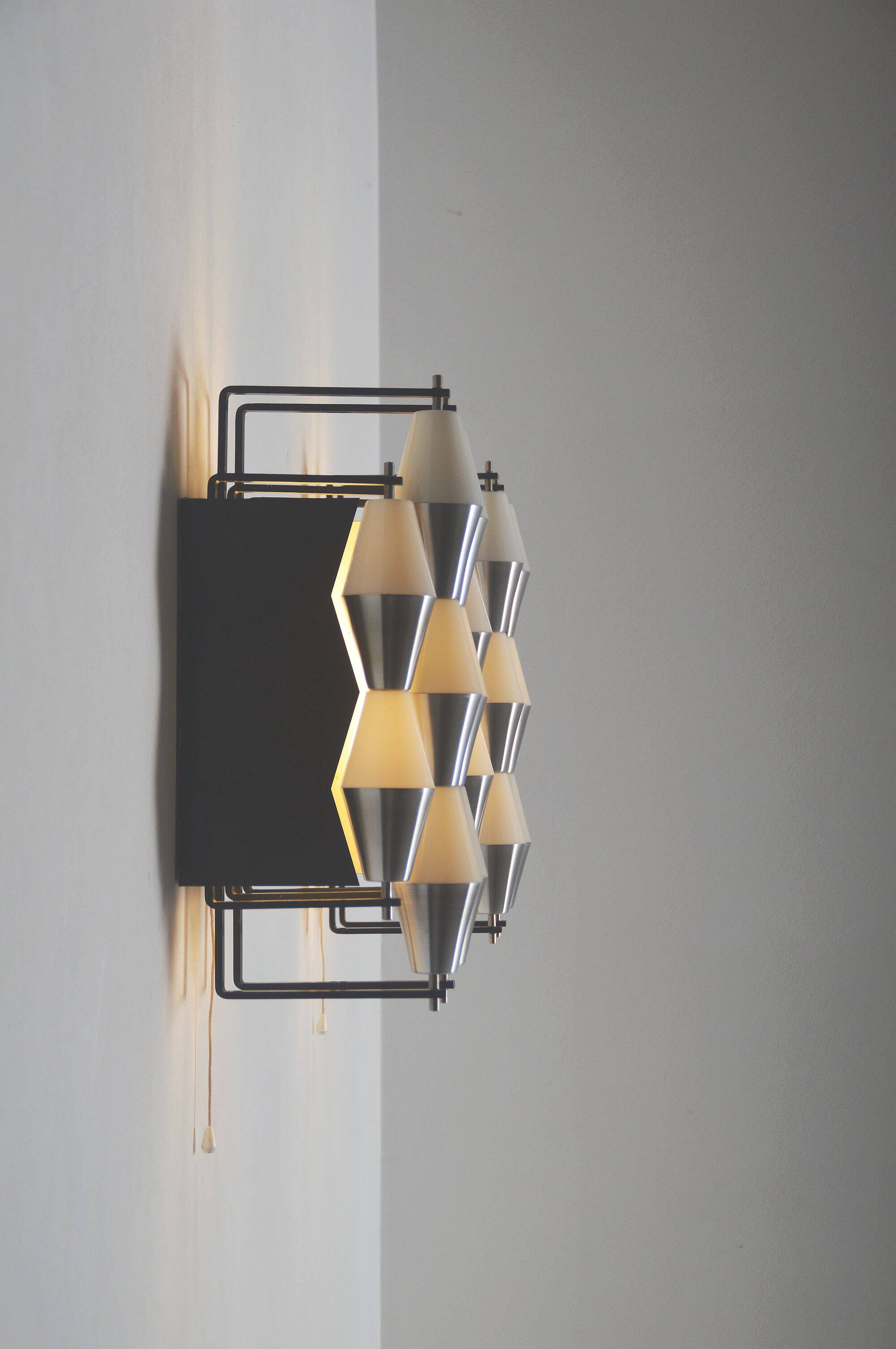 Rare set of wall lamps 'ludiek' by raak, 1960s