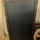 Large vintage mirror with a carved solid wood frame.