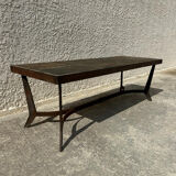 Coffee table with stone top and iron legs