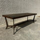 Coffee table with stone top and iron legs