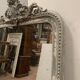 Louis XV style mirror in wood and patinated stucco 19th century