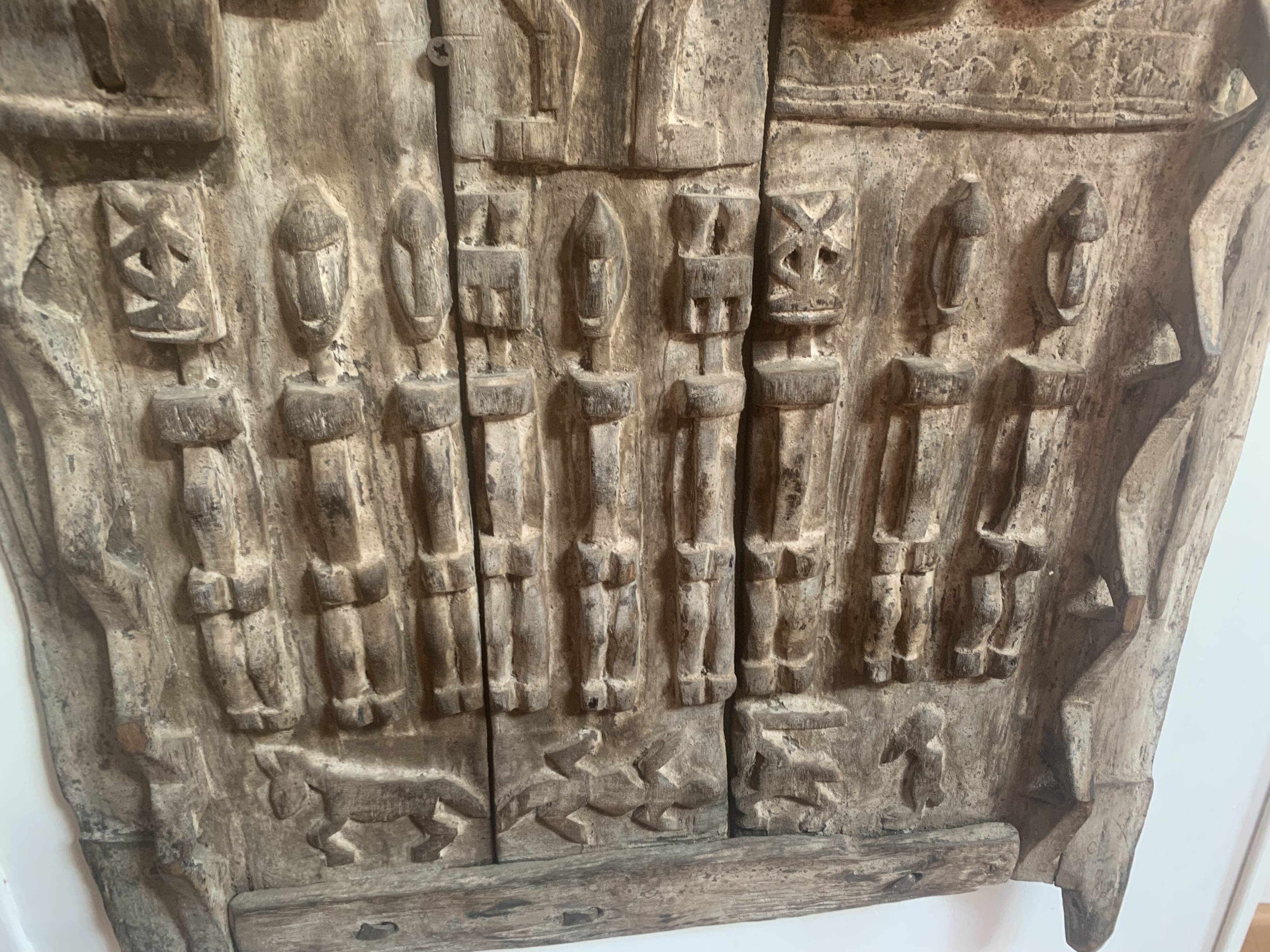 Old carved African door in solid wood – ethnic decoration – pi