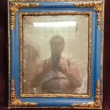 Small antique gilded patinated mirror