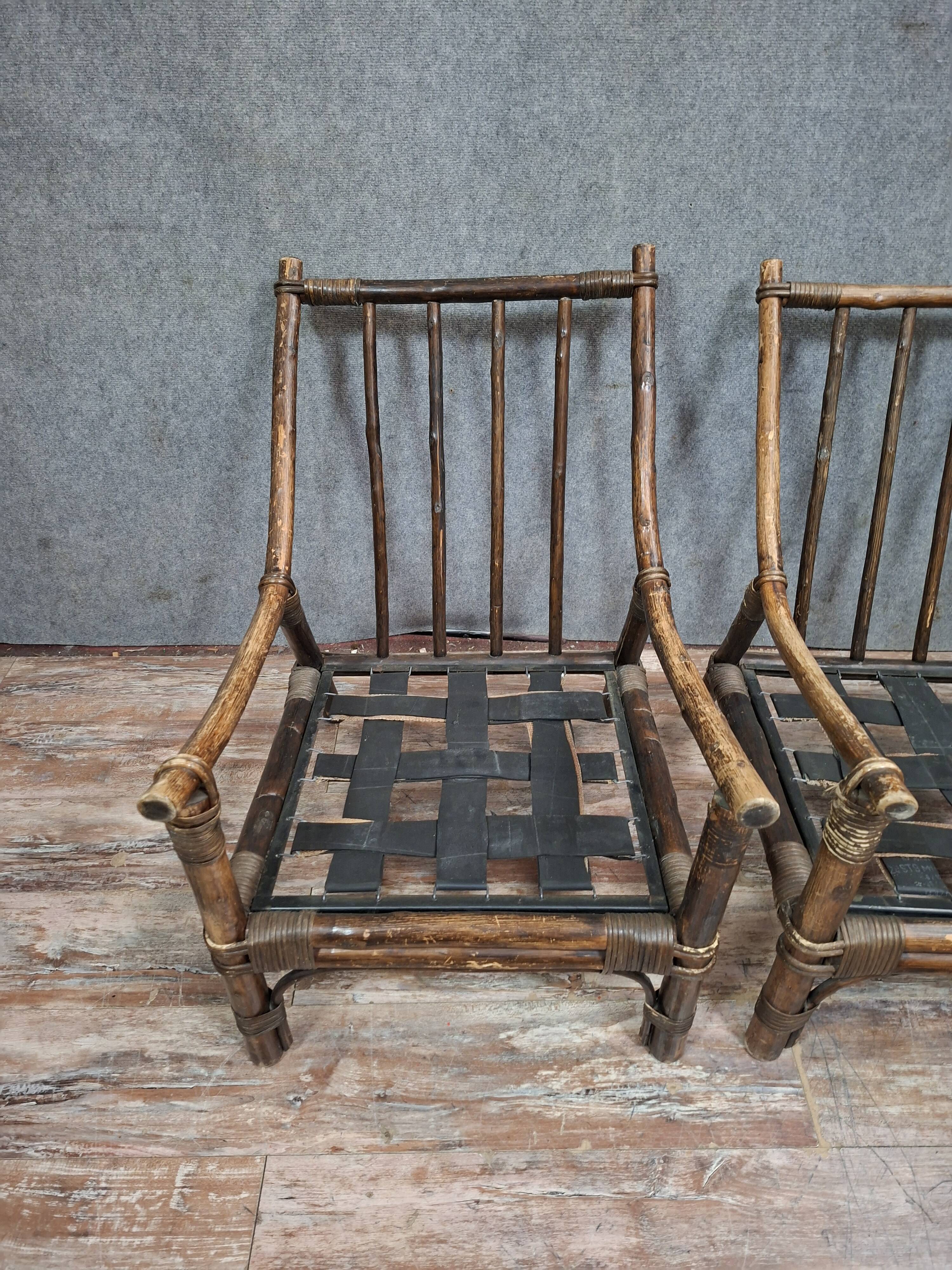 Pair of low bamboo armchairs with an exotic spirit, dating from the early 20th century.