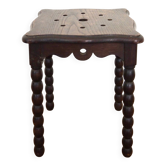 Tabouret en chêne à pieds perlés bobines
