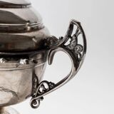 Vintage 1930s silver-plated footed bowl with lid by Warren Rogers New York, featuring a bird motif and ornate details.